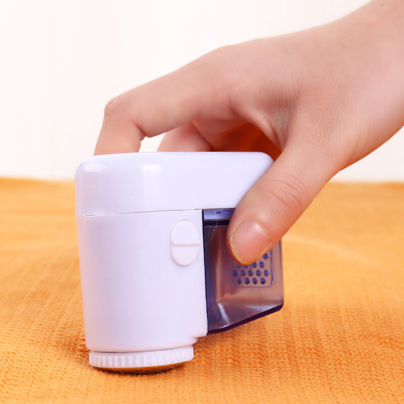Mini - sized battery - operated lint removers, clothes de - pilling devices, household hand - held hair - shaving machines for removing lint from plush clothes, portable de - hairing devices