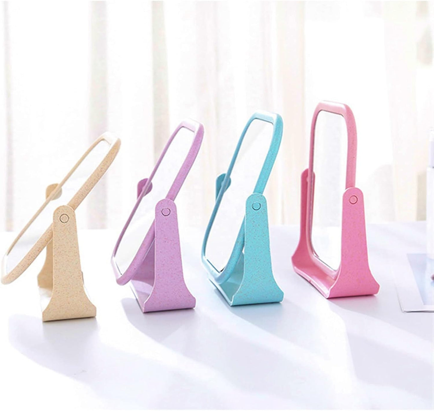 Wholesale double - sided table mirrors. Table - mounted and rotatable. Small mirrors for student makeup. Portable dressing table mirrors, princess - style