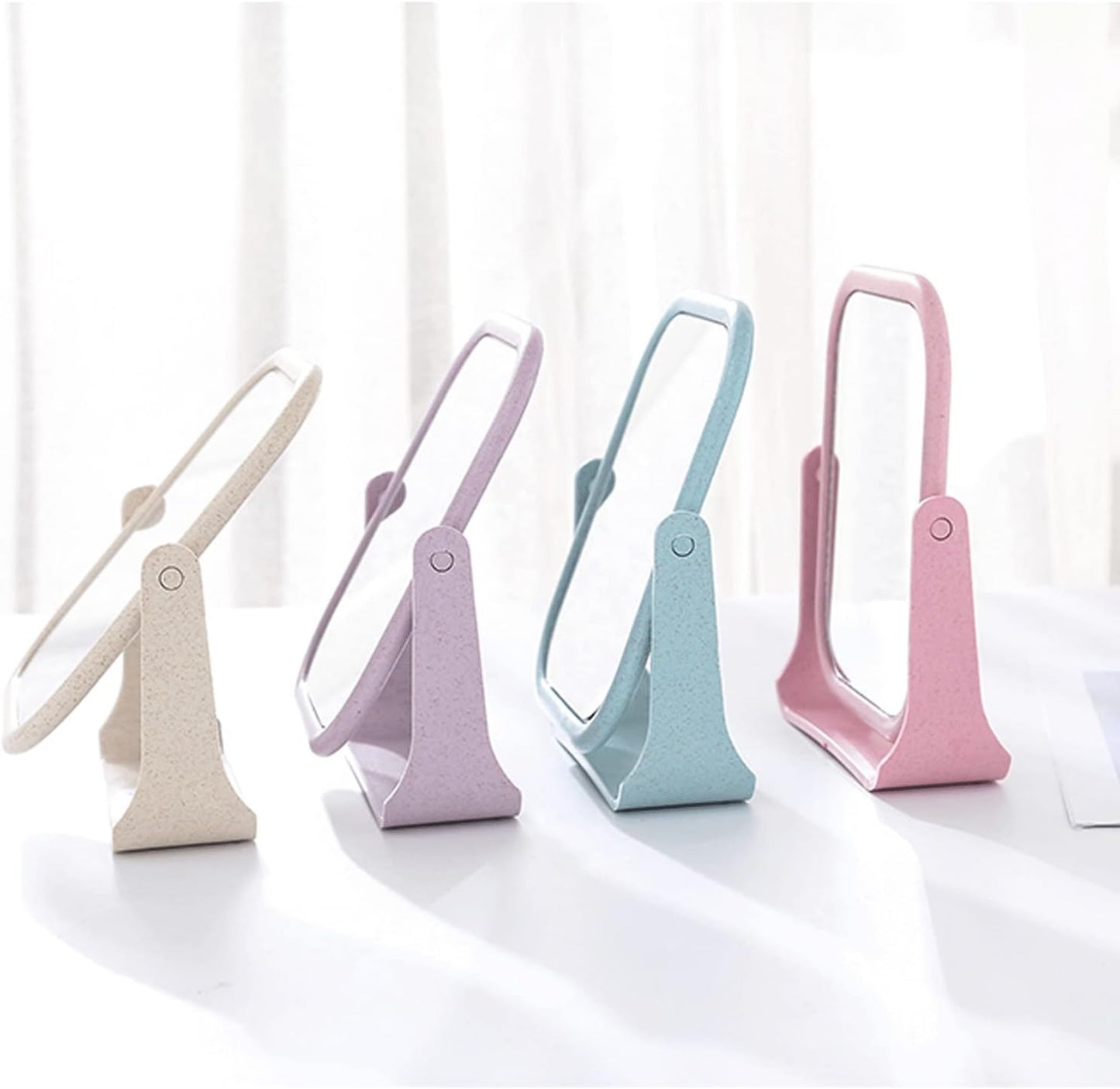 Wholesale double - sided table mirrors. Table - mounted and rotatable. Small mirrors for student makeup. Portable dressing table mirrors, princess - style