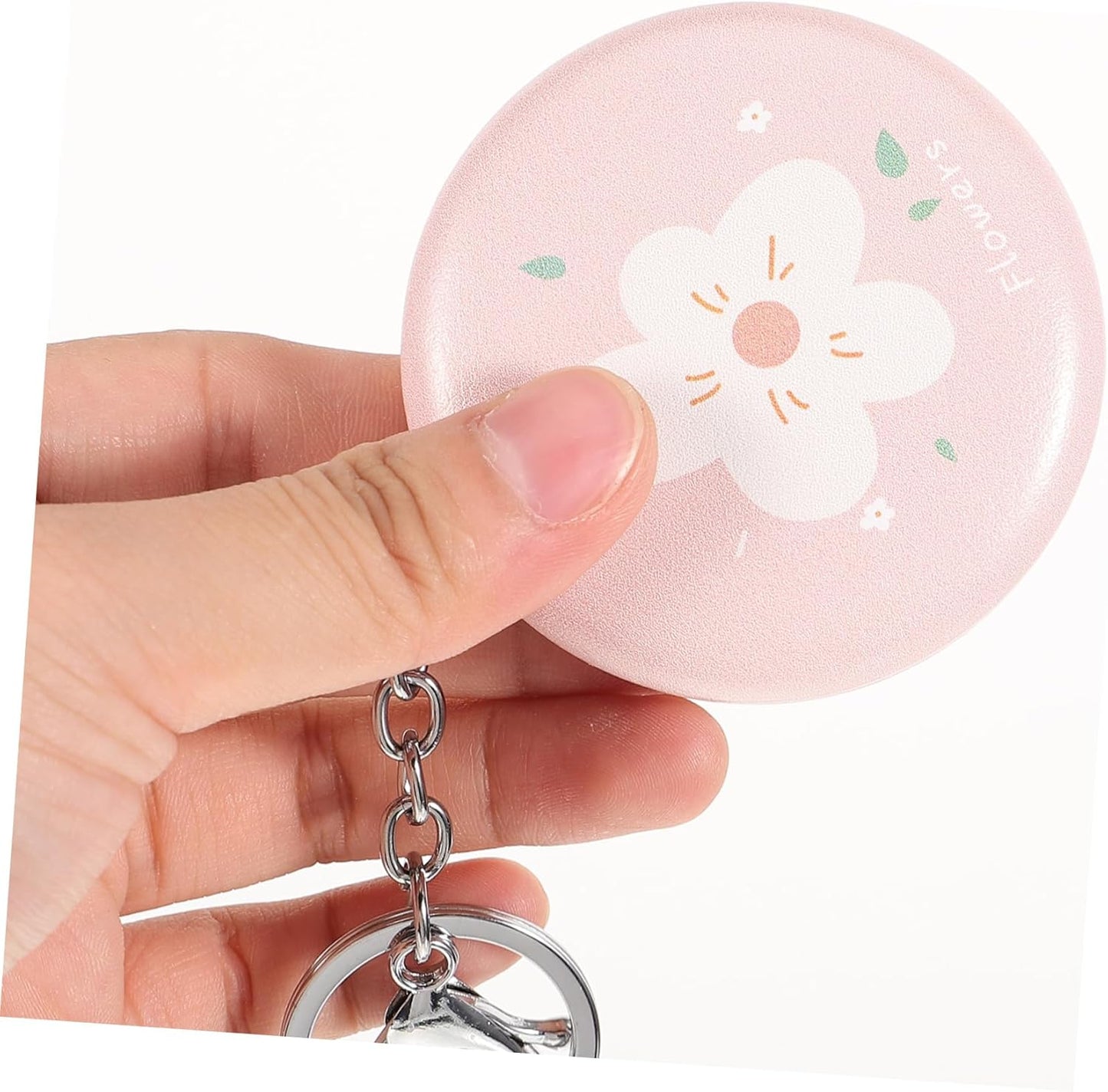 Wholesale mini round pocket mirrors. Metal folding flip - cover. Portable and cute for girls. Creative hand - held makeup touch - up small mirrors with lanyards.