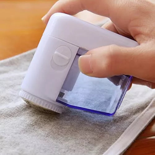 Mini - sized battery - operated lint removers, clothes de - pilling devices, household hand - held hair - shaving machines for removing lint from plush clothes, portable de - hairing devices