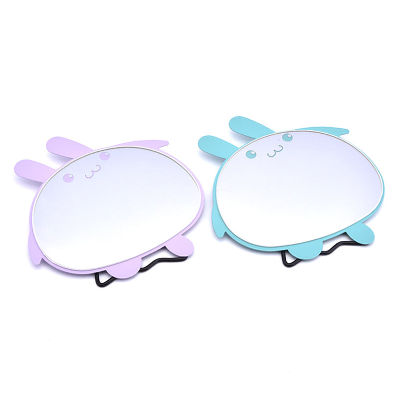 Cartoon - style simple folding table - top makeup mirrors. Cute and creative portable dressing mirrors with rabbit - shaped designs for desktop use