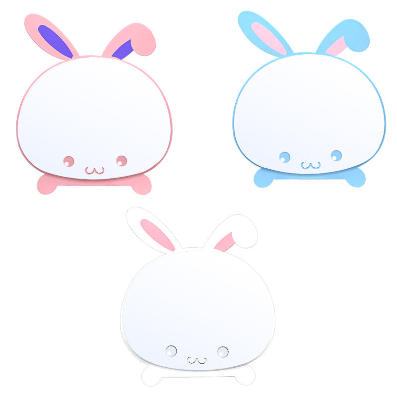 Cartoon - style simple folding table - top makeup mirrors. Cute and creative portable dressing mirrors with rabbit - shaped designs for desktop use