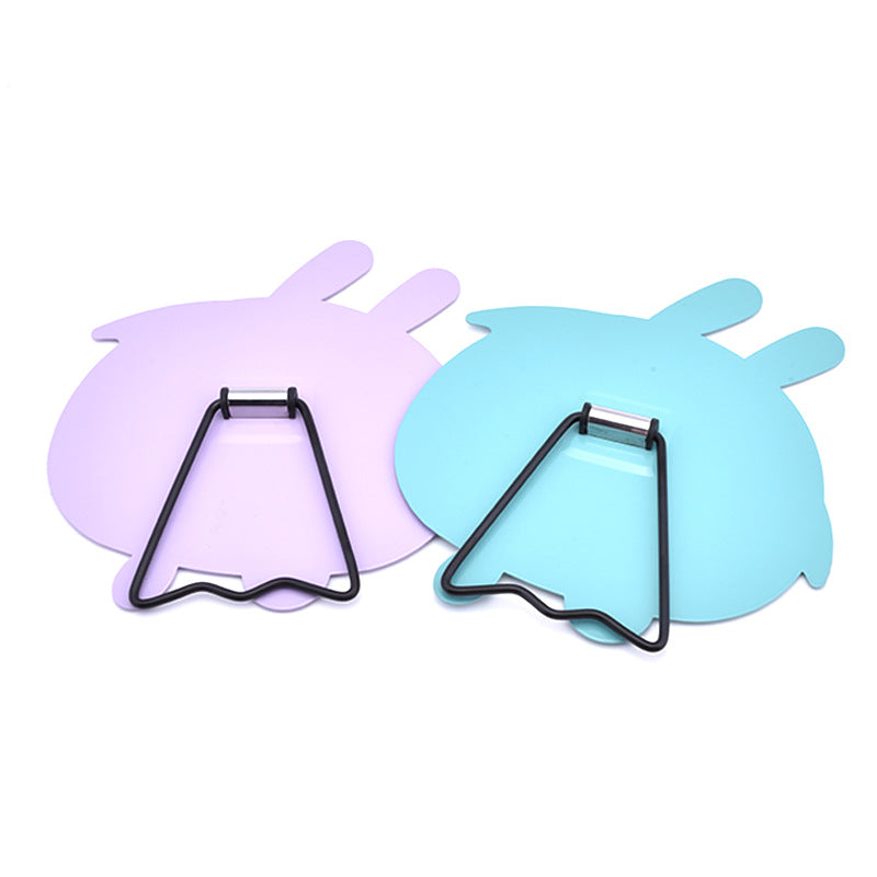 Cartoon - style simple folding table - top makeup mirrors. Cute and creative portable dressing mirrors with rabbit - shaped designs for desktop use